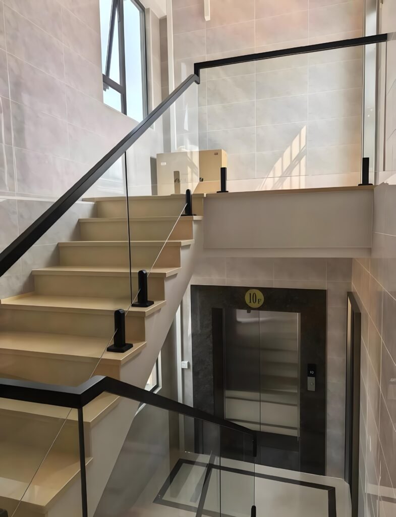 Modern aluminium and glass staircase railing system for Uganda homes